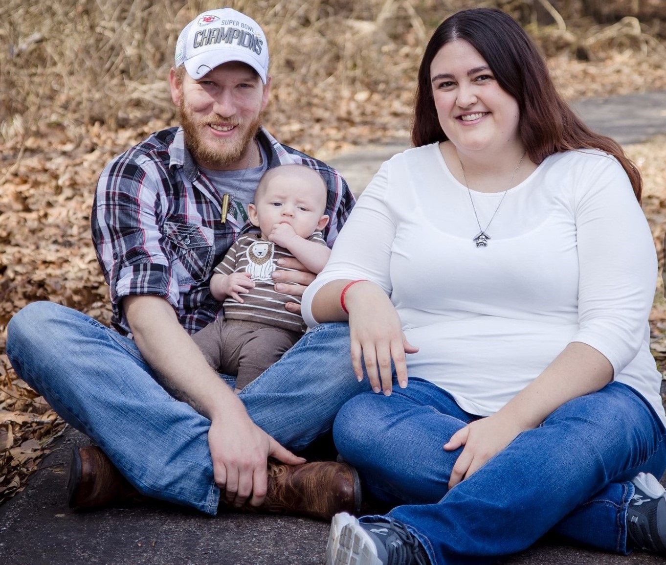 Photo of Codi with her husband and son.